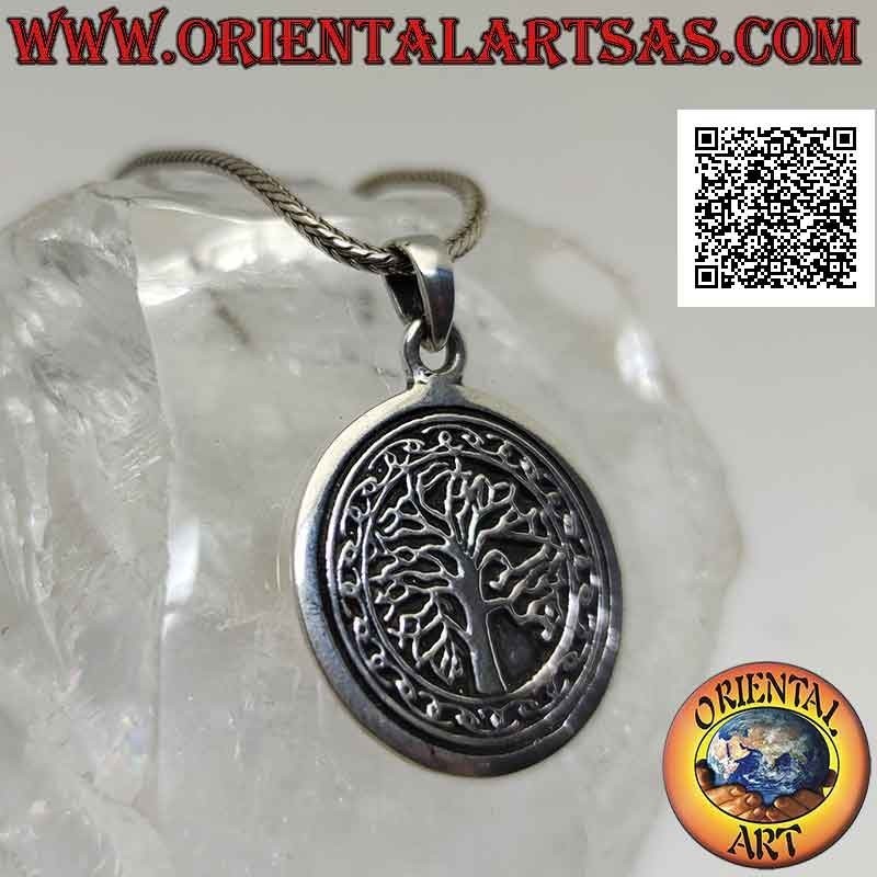 Silver pendant, round medal with Yggdrasil or tree of life surrounded by Celtic knots in bas-relief