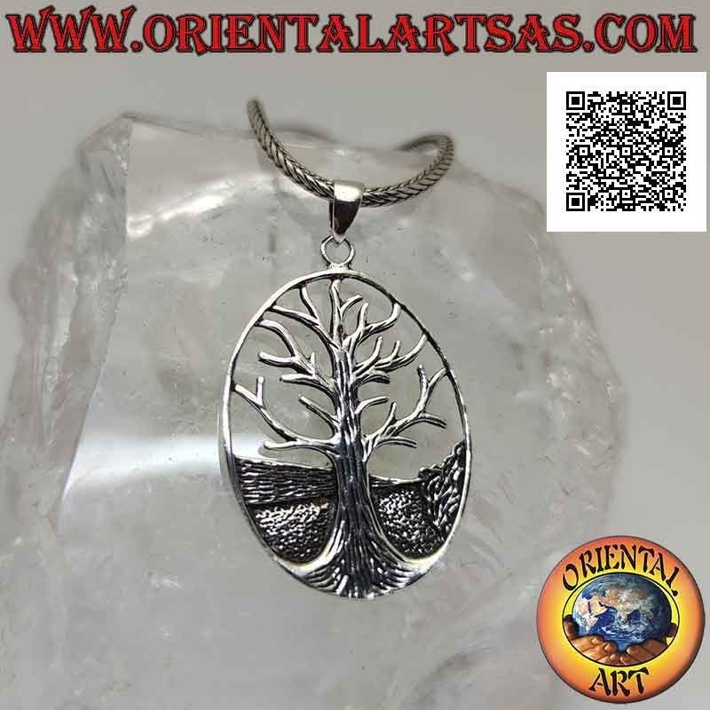 Silver pendant, Yggdrasil or tree of life in the oval with ground in the background