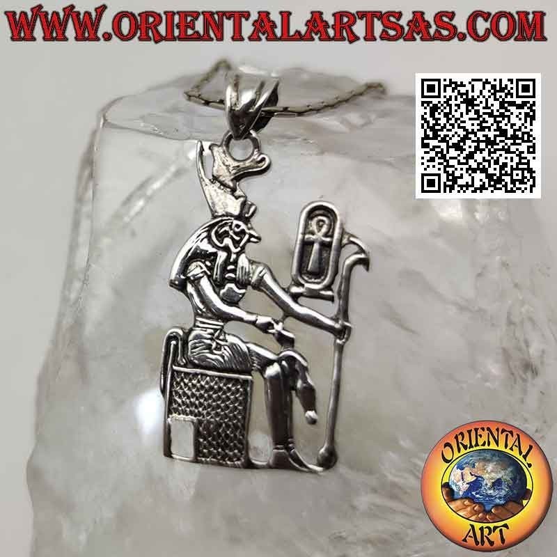 Silver pendant, the Egyptian god Horus sitting on the throne