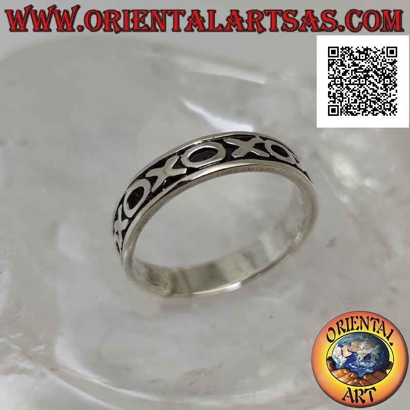 Silver band ring worked with a series of alternating "O" and "X" in bas-relief