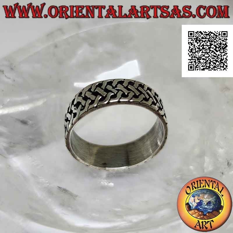 Silver ring with a worked band with a bas-relief woven mesh decoration