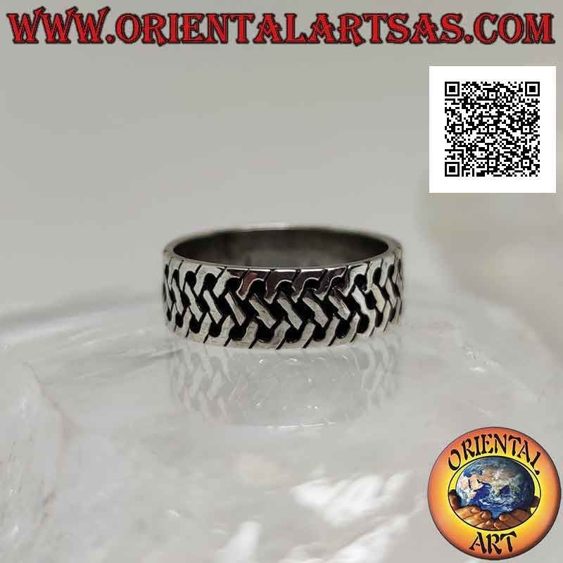 Silver ring with a worked band with a bas-relief woven mesh decoration