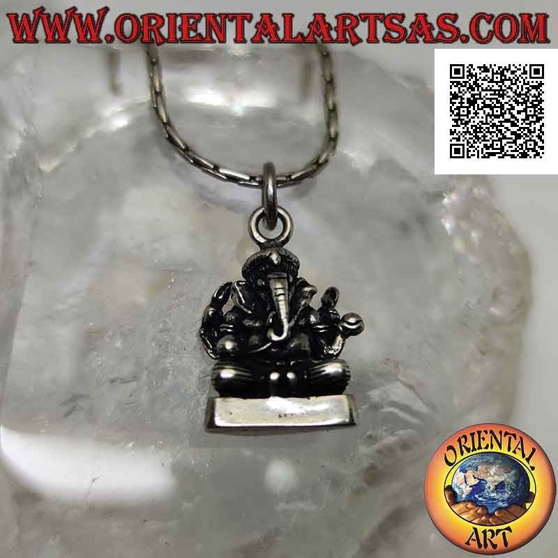 Silver pendant, statue of Ganesha or Ganesh (elephant god) on the smooth altar