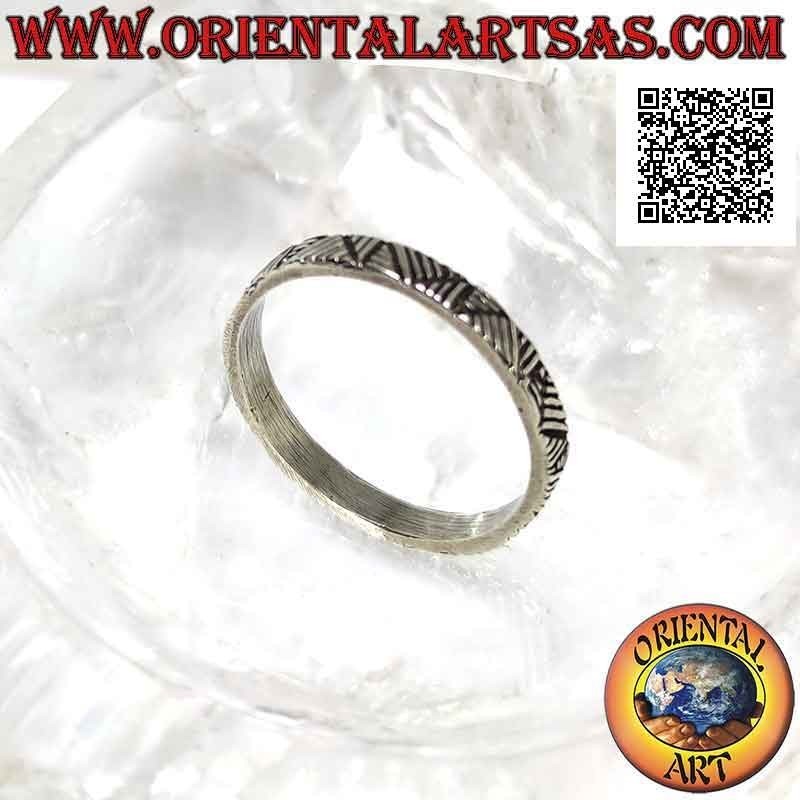 Silver ring with worked band, decoration of carved multidirectional lines