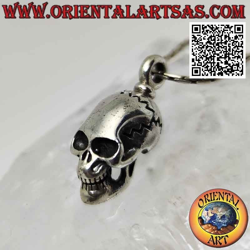 Silver pendant in the shape of a Skull (homo sapiens) with an elongated skull