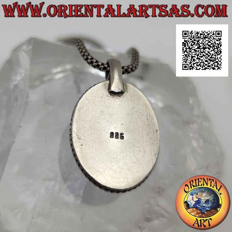 Colgante de plata con cabujón ovalado de malaquita rodeado de tejido