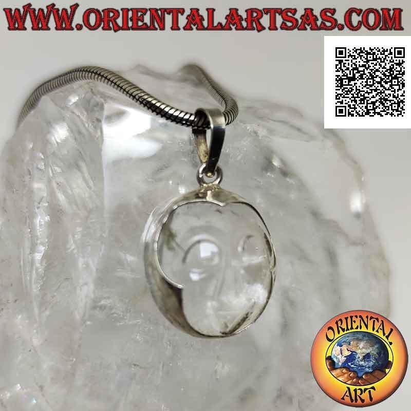 Silver pendant with the face of serenity engraved on rock crystal
