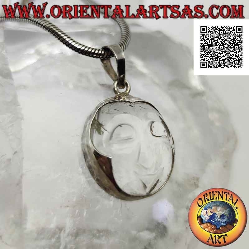 Silver pendant with the face of serenity engraved on rock crystal