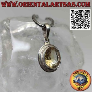 Silver pendant with oval yellow topaz surrounded by interlacing and smooth edge