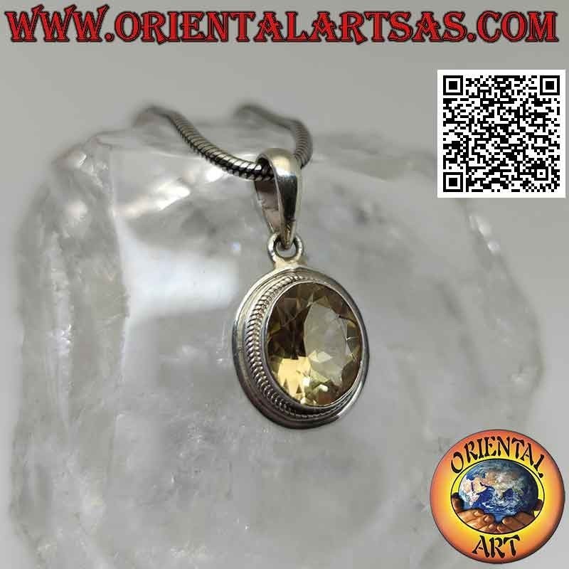 Silver pendant with oval yellow topaz surrounded by interlacing and smooth edge