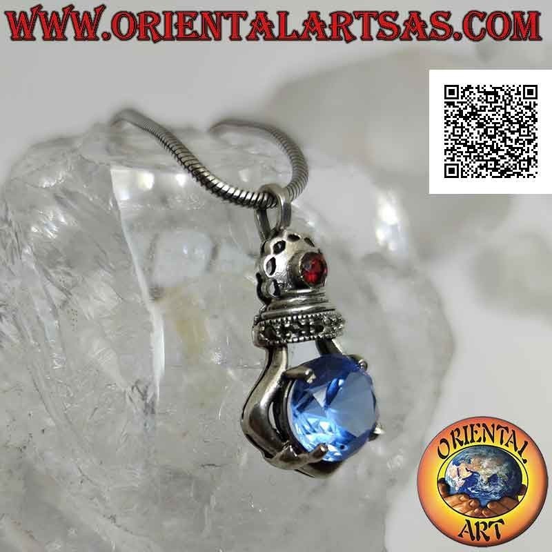 Silver pendant with horizontal blue topaz set and a marcasite and garnet crown