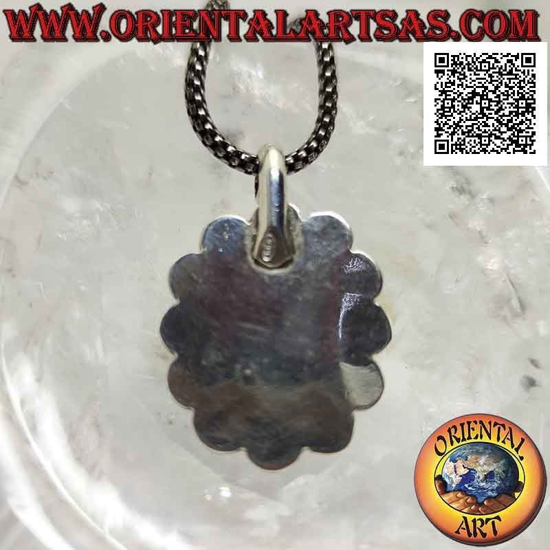 Colgante de plata con labradorita fluorescente azul medianoche rodeada de discos perforados