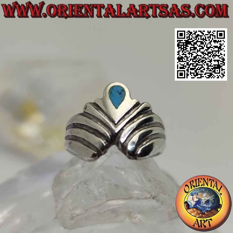 Silver ring with inverted teardrop turquoise between a series of oblique V-shaped lines