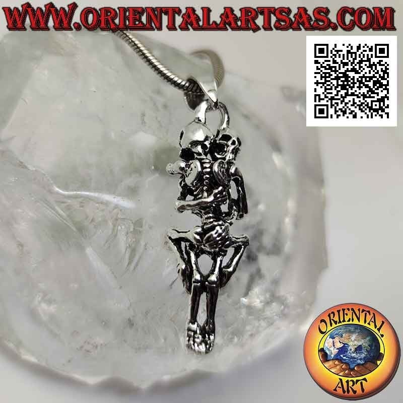 Silver pendant, pair of skeletons having sex