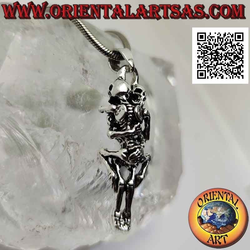 Silver pendant, pair of skeletons having sex