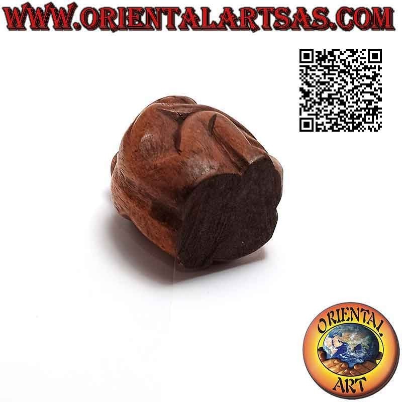 7.5 cm sculpture of a couple in consoling embrace in suar wood