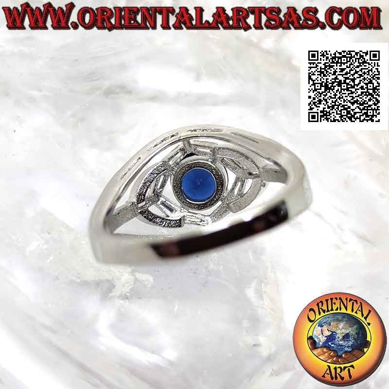 Bague en argent avec saphir synthétique rond serti entre jeux elliptiques de zircons blancs