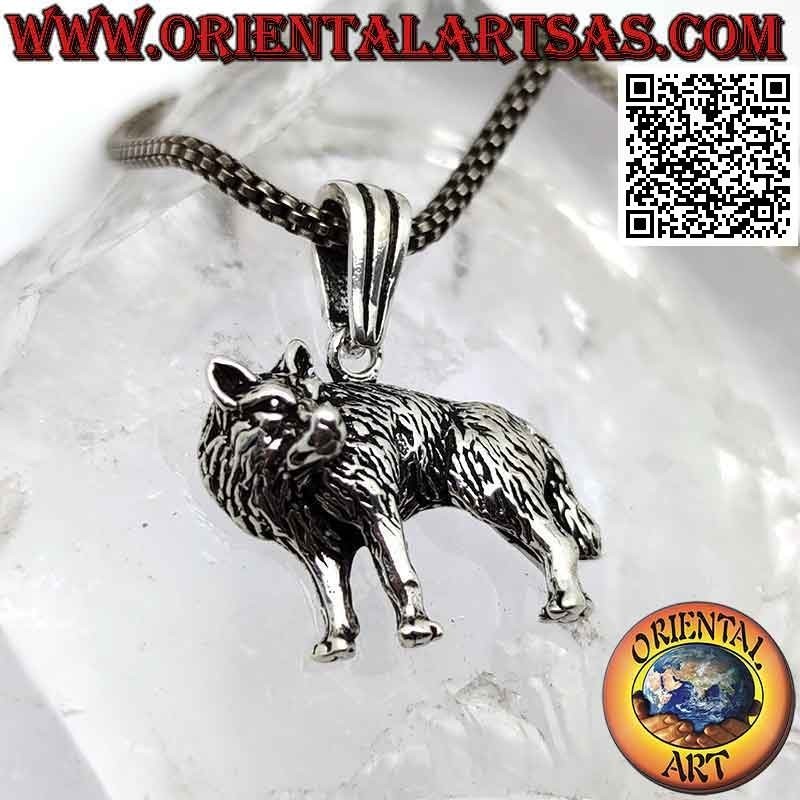 Pendentif en argent, loup sur le côté avec tête tournée en relief