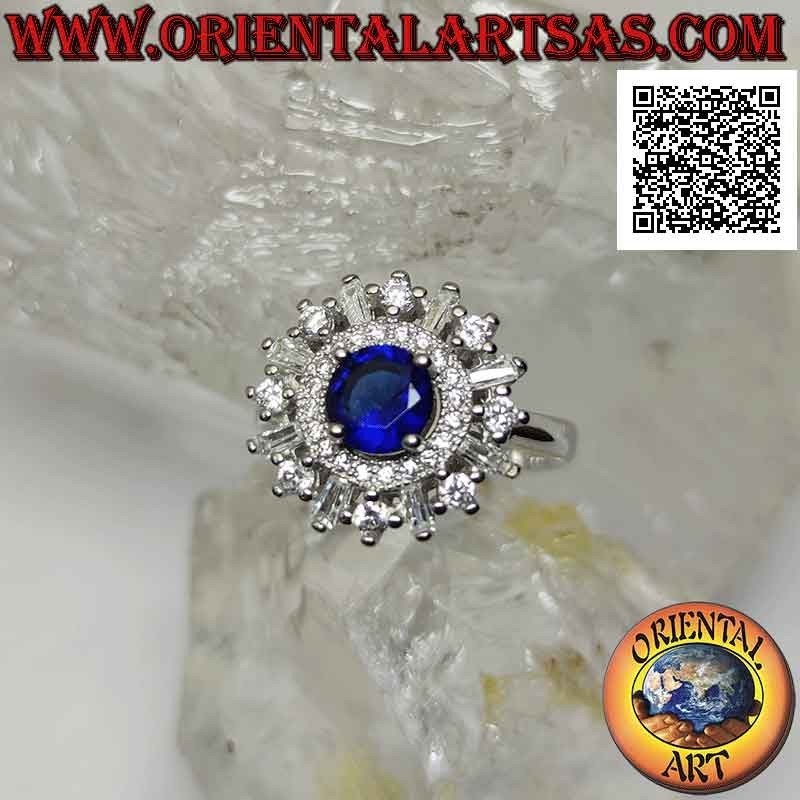 Bague en argent avec saphir synthétique rond serti entouré d'un anneau et de zircons ronds et baguette