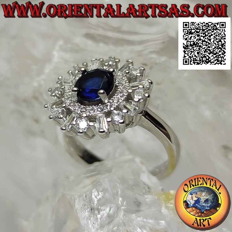 Bague en argent avec saphir synthétique rond serti entouré d'un anneau et de zircons ronds et baguette