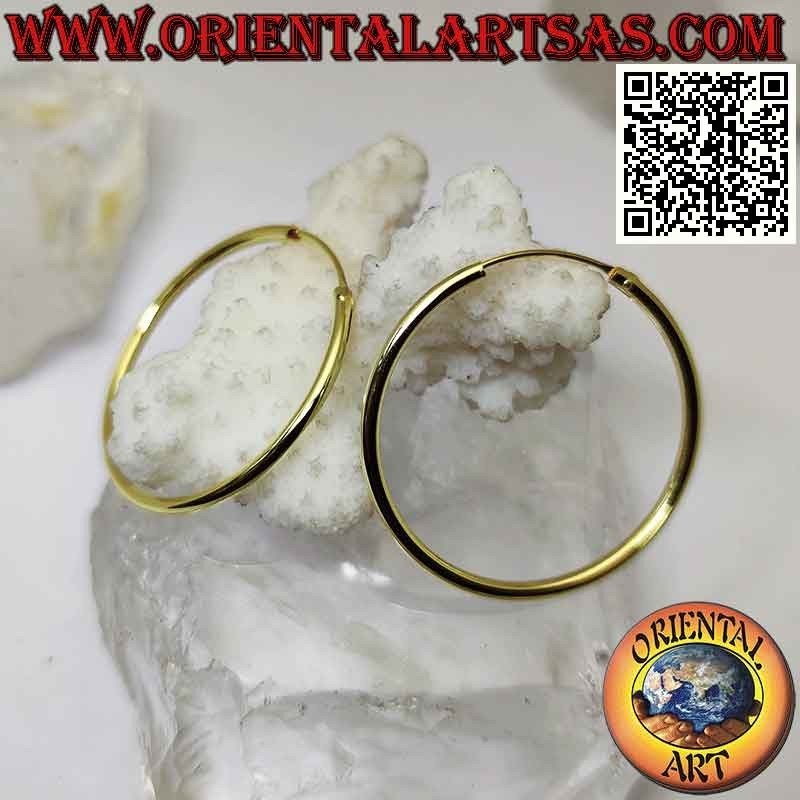 Aretes de plata con círculos lisos y chapados en oro de 35x2 mm.