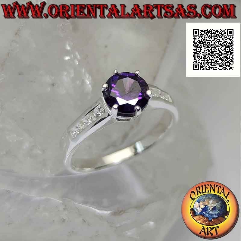 Silver ring with round synthetic amethyst set with white zircons on the sides