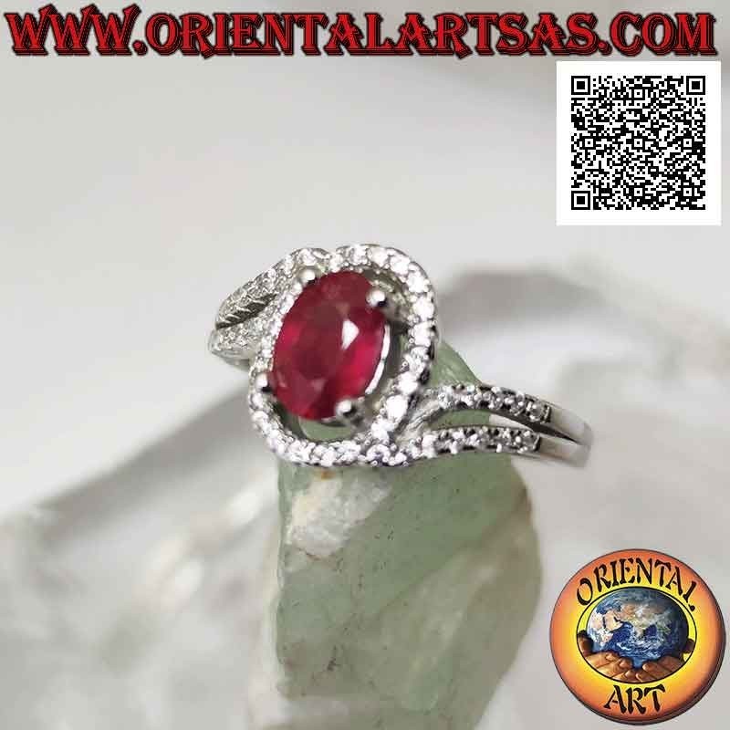 Anello in argento (solitario asimmetrico a due) con rubino di sintesi ovale incastonato e zirconi bianchi