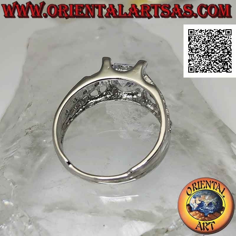 Silver ring with white square zircon set raised with white zircons and openwork on the sides