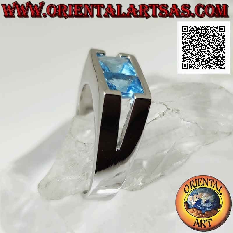 Silver ring with a pair of square topazes on a smooth rectangular setting