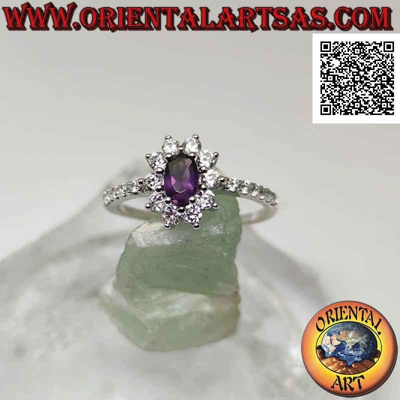 Silver ring with white cubic zirconia flower set with oval amethyst and cubic zirconia on the sides