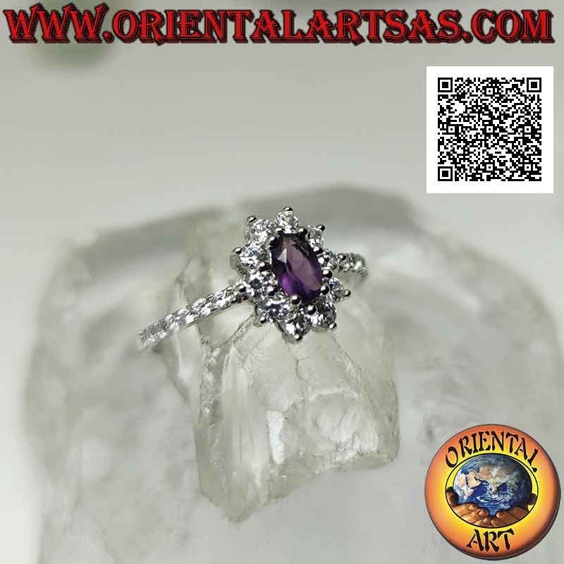Silver ring with white cubic zirconia flower set with oval amethyst and cubic zirconia on the sides