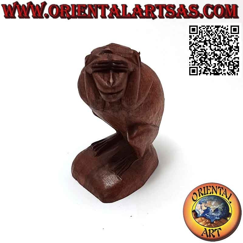 Sculpture d'un des trois singes de la sagesse "Je ne vois pas" en bois de suar 10 cm