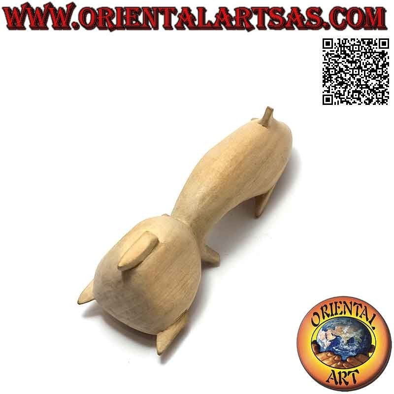 Skulptur eines Delphins, der zwischen zwei 15 cm langen Hibiskusholzkugeln jongliert