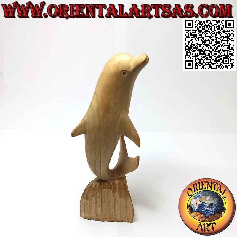Sculpture of a dolphin posing on the cliff in 20 cm hibiscus wood