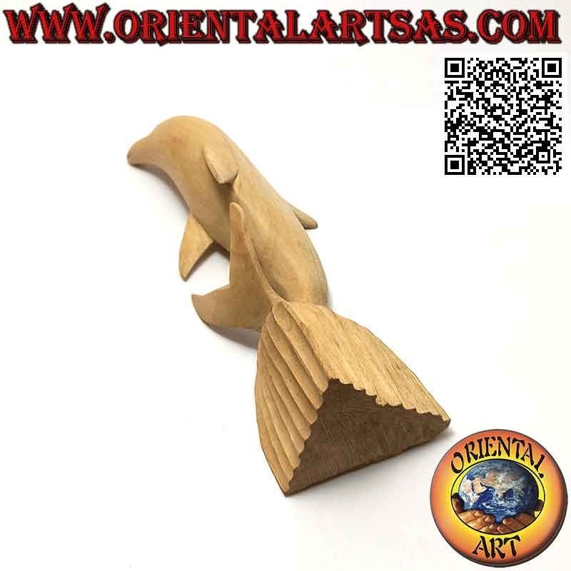 Sculpture of a dolphin posing on the cliff in 20 cm hibiscus wood