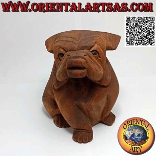 Sculpture of a seated English bulldog hand carved from a single 16 cm block of suar