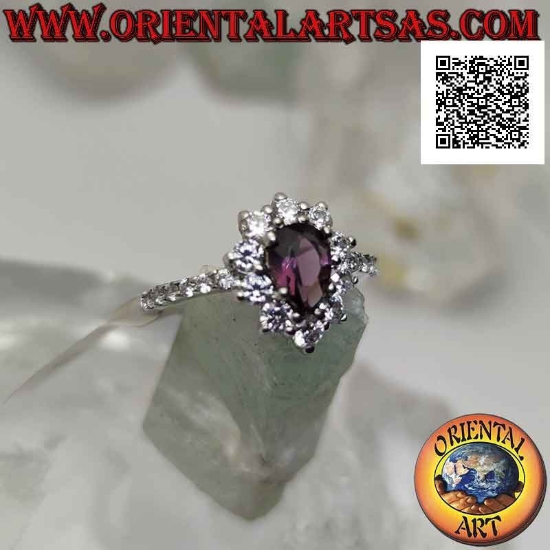 Silver ring with white cubic zirconia flower set with drop-shaped amethyst