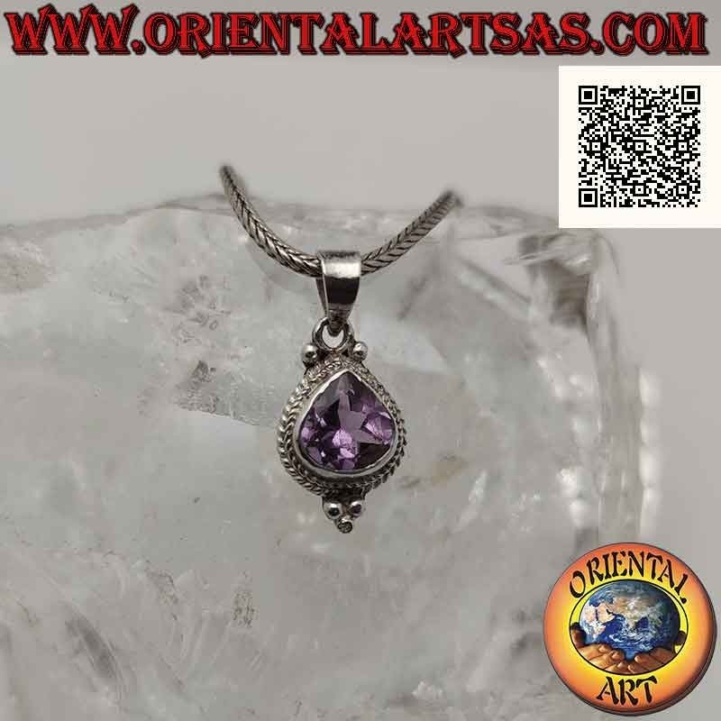 Silver pendant with drop-shaped amethyst surrounded by interweaving and three balls below (B)