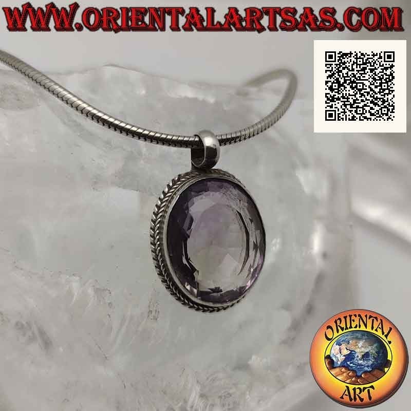 Silver pendant with large natural oval faceted amethyst surrounded by interweaving