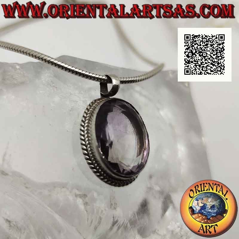 Ciondolo in argento con grande ametista naturale ovale sfaccettata contornata da intreccio