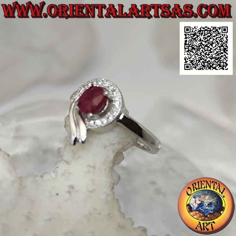Silver ring with oval synthetic ruby set wrapped in a line of white and smooth zircons