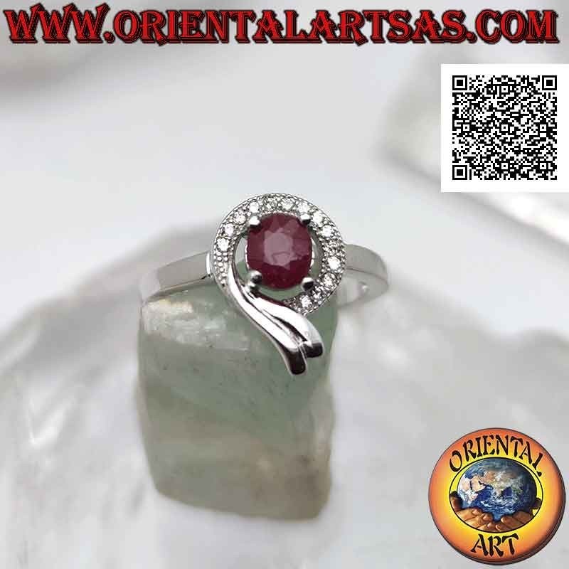 Silver ring with oval synthetic ruby set wrapped in a line of white and smooth zircons