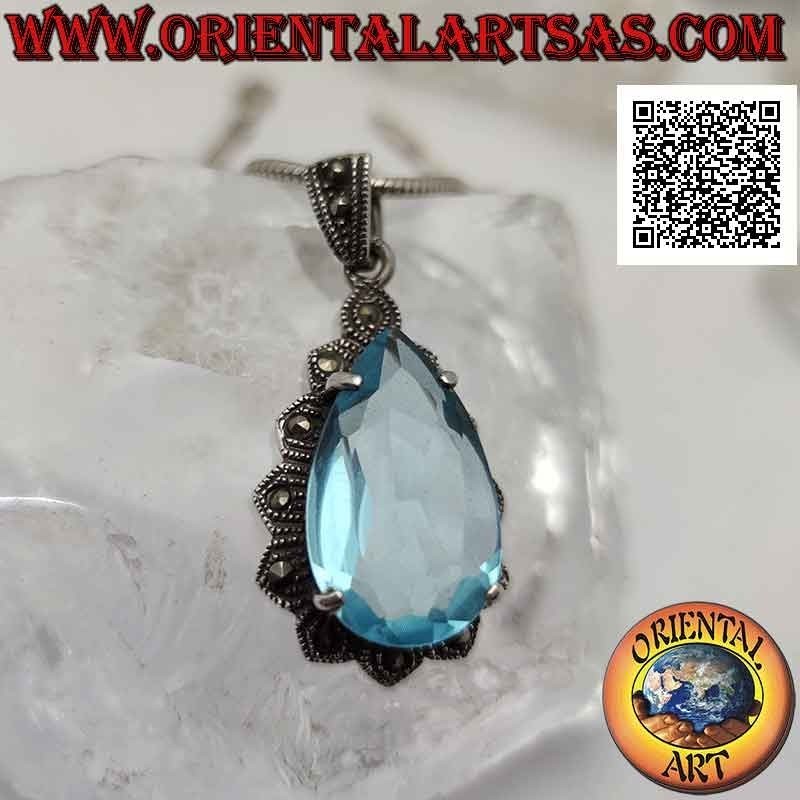 Colgante de plata con gran topacio azul en forma de lágrima engastado en una montura imperial tachonada con marcasita