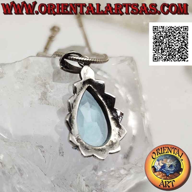 Silver pendant with large teardrop blue topaz set in an imperial setting studded with marcasite