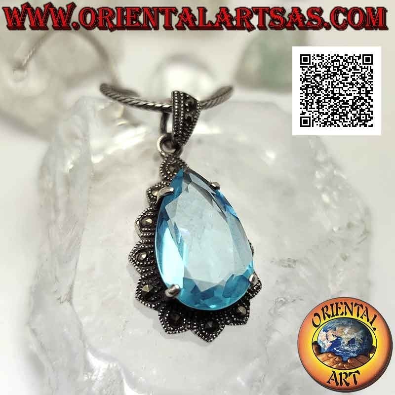 Ciondolo in argento con grande topazio blu a goccia incastonato su montatura imperiale tempestata di marcassite