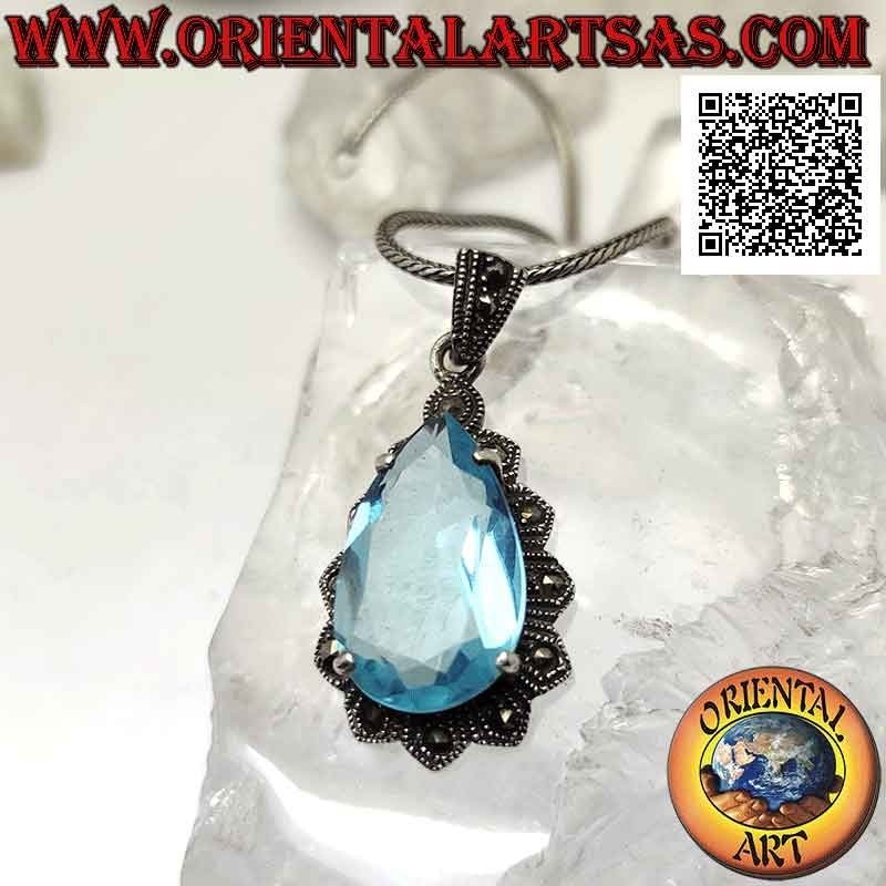Colgante de plata con gran topacio azul en forma de lágrima engastado en una montura imperial tachonada con marcasita