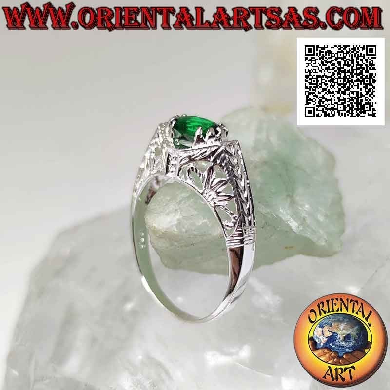 Silver ring with horizontal oval synthetic emerald set in a perforated baroque setting