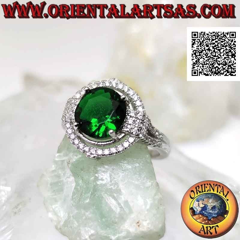 Silver ring with round synthetic emerald set surrounded by zircons with relief on the cardinal points