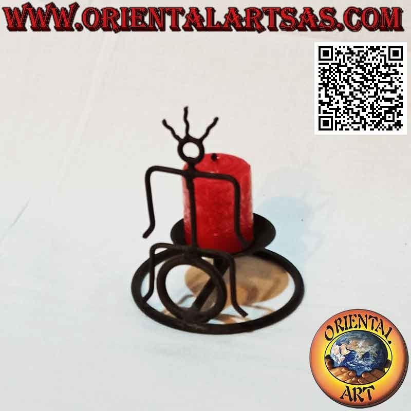 Hand made "indigenous little man" candle holder in wrought iron