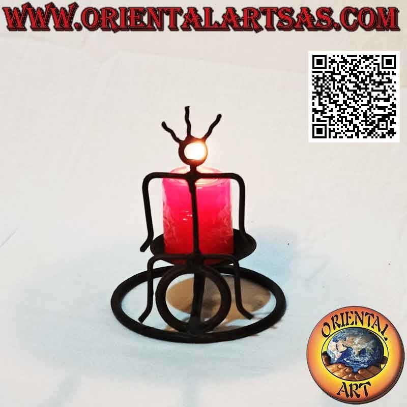 Hand made "indigenous little man" candle holder in wrought iron